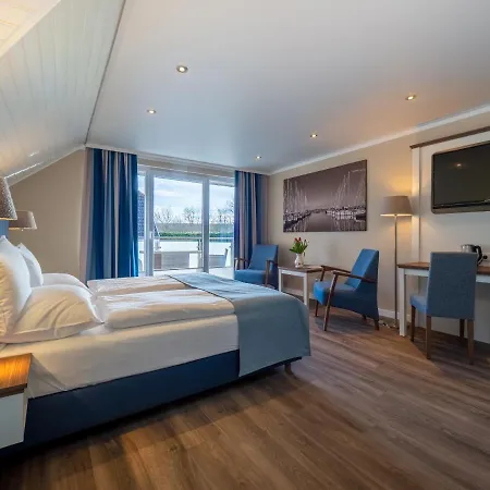 Tom's Hus 3* Хайлигенхафен